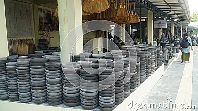 The group of Stone mortar without pestle for sale at local market Editorial Stock Photo