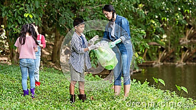 Group student Charity and recycle plastic for environment. Stock Photo