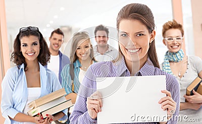 Group of students with blank sheet for copyspace Stock Photo