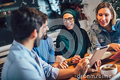 Students of diverse ethnic learning at home. Learning and preparing for university exam Stock Photo