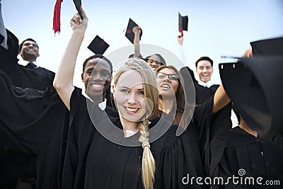 Group Students Hands Raised Graduation Concept Stock Photo