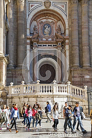 Group of students outside Malaga Cathedral Editorial Stock Photo