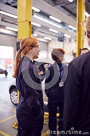 Group Of Students Studying For Auto Mechanic Apprenticeship At College Stock Photo