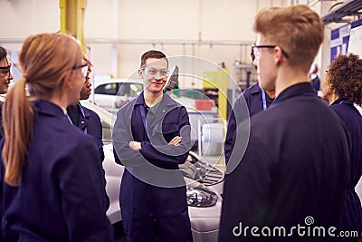 Group Of Students Studying For Auto Mechanic Apprenticeship At College Stock Photo