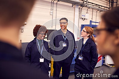 Group Of Students Studying For Auto Mechanic Apprenticeship At College Stock Photo