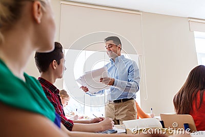Group of students and teacher with test results Stock Photo