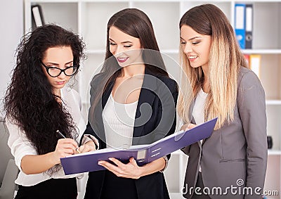 A group of successful businessmen. Discussion of the important c Stock Photo