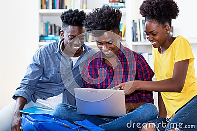 Group of talking african american computer science students Stock Photo