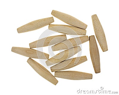 Group of tapered hardwood dowels Stock Photo