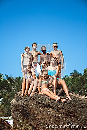 Group of teen friends on the beach Stock Photo