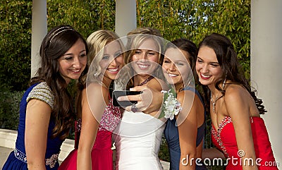 A Group of Teenage Prom Girls Taking a Selfie Stock Photo