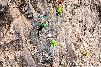 Group Of Teenager Climbers Climbing A Rock Wall Editorial Stock Photo
