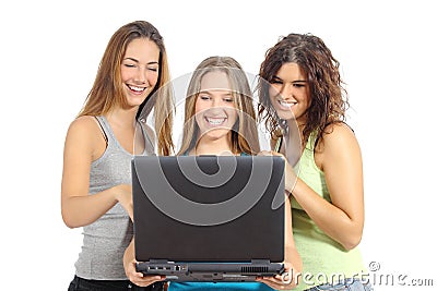 Group of teenager girls browsing internet in a laptop Stock Photo