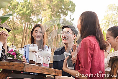 Group of 6 teenagers having fun together without liquor in cafe Stock Photo
