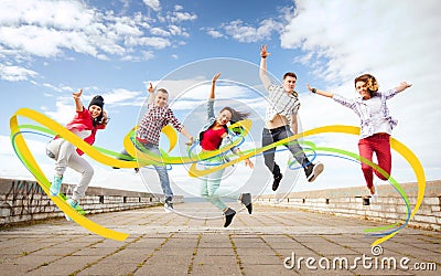 Group of teenagers jumping Stock Photo