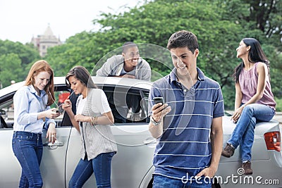 Group of teens with car Stock Photo