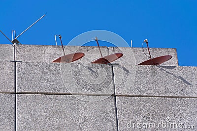 Group of telecommunications antennas on building terrace in Guatemala, Central America. Stock Photo