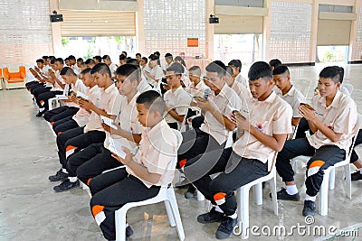 A group of Thai student in their school uniform is praying to th Editorial Stock Photo