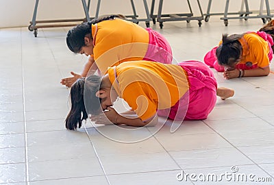 A group of Thai students practicing the old Thai dance in Pattravadhi school Hua Hin, Thailand January 20, 2018 Editorial Stock Photo