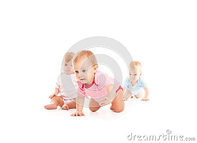 Babies crawling over white Stock Photo