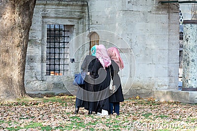 Group of Three Islamic dressed Ladies making self Portrait Photo Editorial Stock Photo