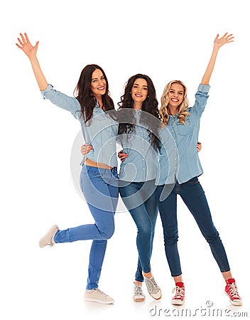 Group of three young women celebrating success Stock Photo