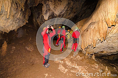 A group of tourist in a cave. Editorial Stock Photo