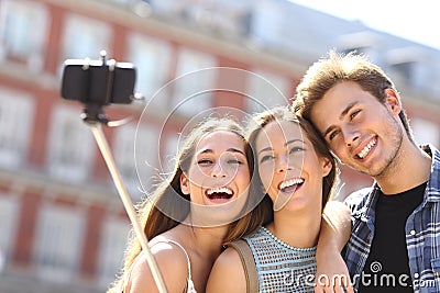 Group of tourist friends taking selfie with smart phone Stock Photo