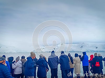 A group of tourist watching beautiful glacier in Antarctica on cruise Editorial Stock Photo