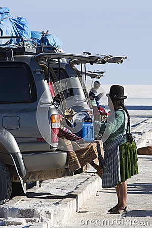 Group of tourists and 4x4 cars at the Isla Incahuasi in the Salar Uyuni Editorial Stock Photo