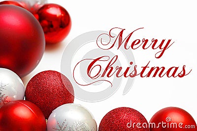 Group of Tree Ornaments Framing Merry Christmas Text Stock Photo