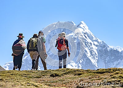 A group of trekkers on the Ausangate trail in the Peruvian Andes Editorial Stock Photo