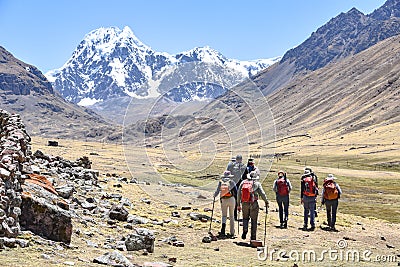 A group of trekkers on the Ausangate trail in the Peruvian Andes Editorial Stock Photo