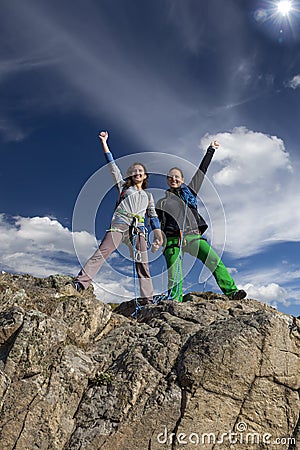 Group of two happy female climbers Stock Photo