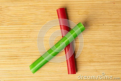 Sweet stick candy on light wood Stock Photo