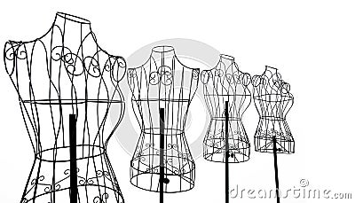 Group of tylish wire tailor's mannequin isolated on white Stock Photo