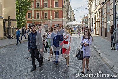 Group of ukrainian youth walking on the street Editorial Stock Photo