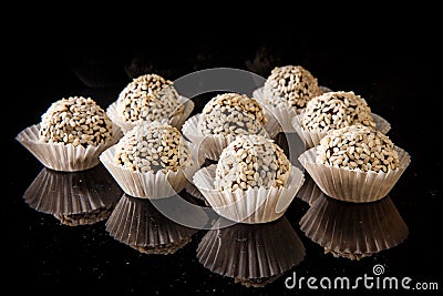 Group of useful round handmade candy with sesame seeds Stock Photo