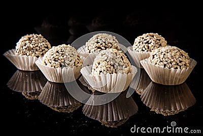 Group of useful round handmade candy with sesame seeds Stock Photo