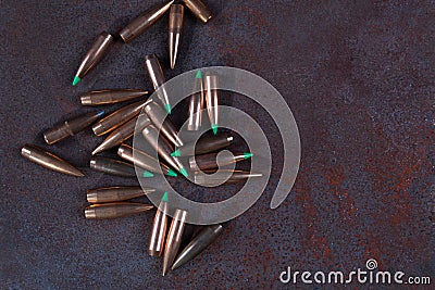 Group of various bullets on dark background. Stock Photo