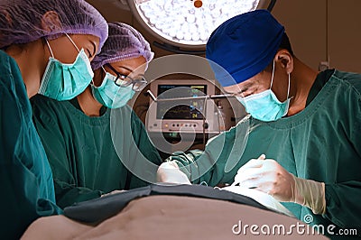 Group of veterinarian surgery in operation room Editorial Stock Photo