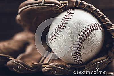 Vintage baseball gear on a wooden background Stock Photo