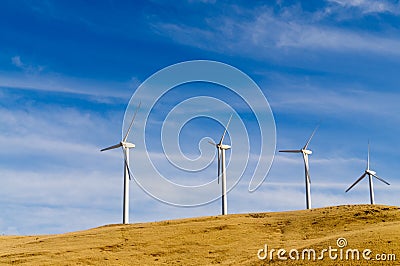 Group of wind powered generators Stock Photo