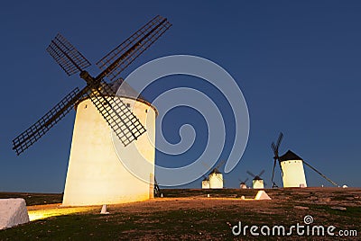 Group of windmills in night Stock Photo