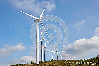 Group of windmills for renewable electric energy production Stock Photo