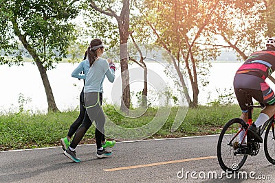 Group of woman exercise running on park trail in the morning. Editorial Stock Photo