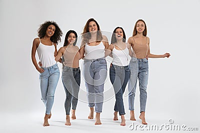 Group of women with different body types on background Stock Photo