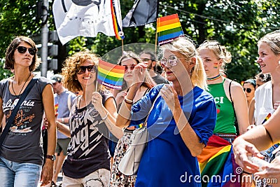 Group of women with flags participating in the LGBTQ pride march Editorial Stock Photo