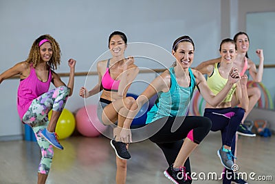 Group of women performing aerobics Stock Photo