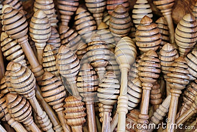 Group of wooden honey dippers Stock Photo